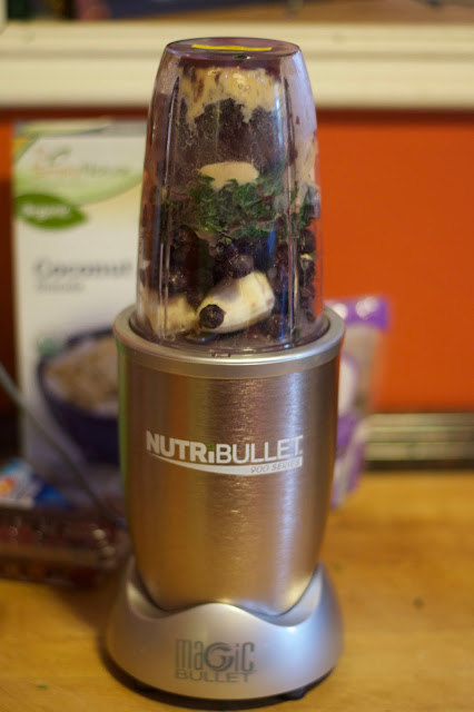 All the ingredients for the acai bowl being blended up in a nutribullet.  