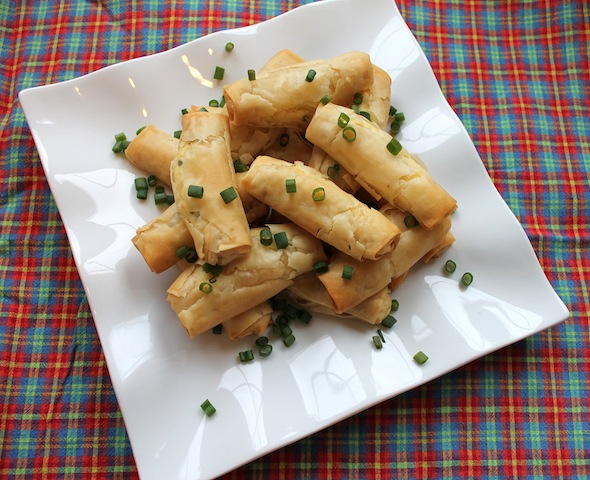 Food Lust People Love: Crispy, crunchy filo pastry baked around a lovely green onion, feta and ricotta cheese filling makes these little filo cheese rolls the perfect snack.
