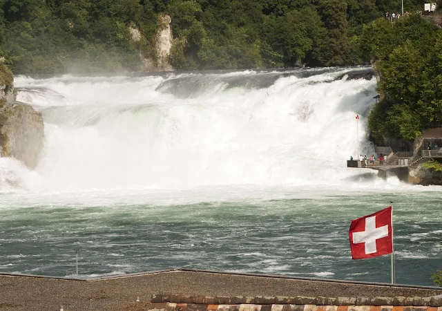 Rhine Falls and Swiss Flag on a day trip from Zurich