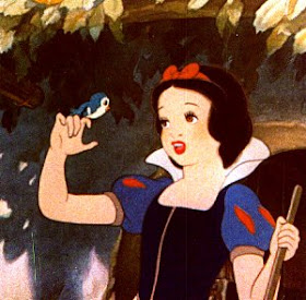 Snow White holding bird Snow White and the Seven Dwarfs 1937 animatedfilmreviews.filminspector.com