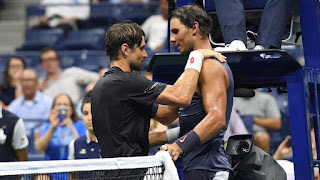 Nadal through to round two after Ferrer retires