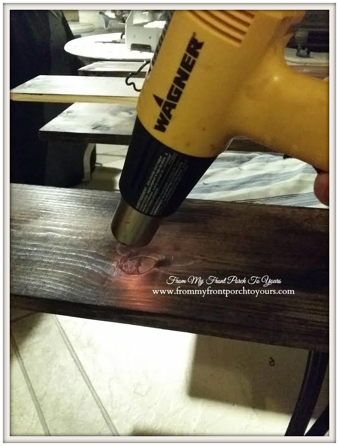 Finish process with heat gun to create wood beams for living room at From My Front Porch To Yours.