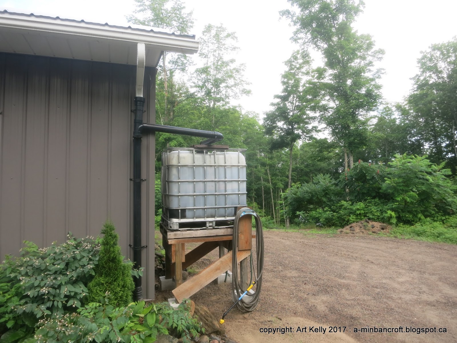 Living Off Grid 45.05 N, 77.85 W WATER TANKS and GARDENS