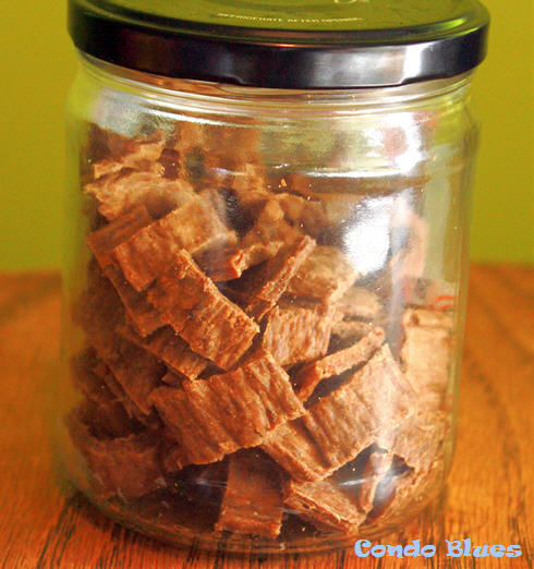 store dog treats in a recycled jar to keep them fresh
