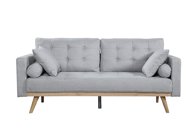 light gray sofa with cushions