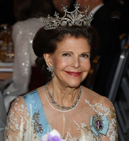 Queen Silvia in Elie Saab. Crown Princess Victoria in Camilla Thulin. wearing Angel Sanchez in pink. Princess Sofia diamond tiara