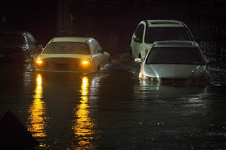 flooded car, sandy 