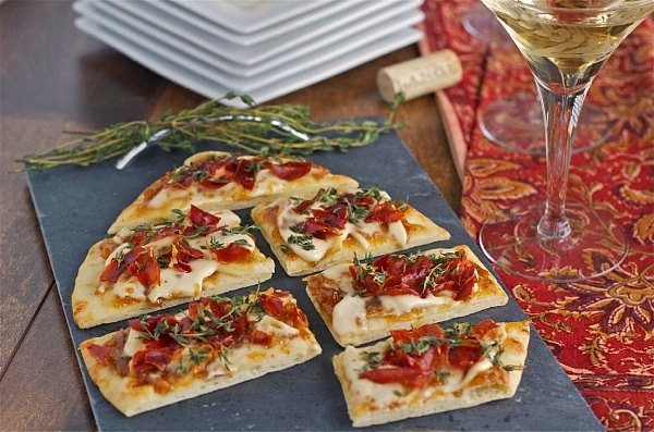 Smoky bourbon brie flatbread with fig jam and crispy prosciutto, an easy appetizer