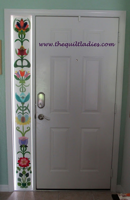 Adding painted flowers to doorway glass pattern