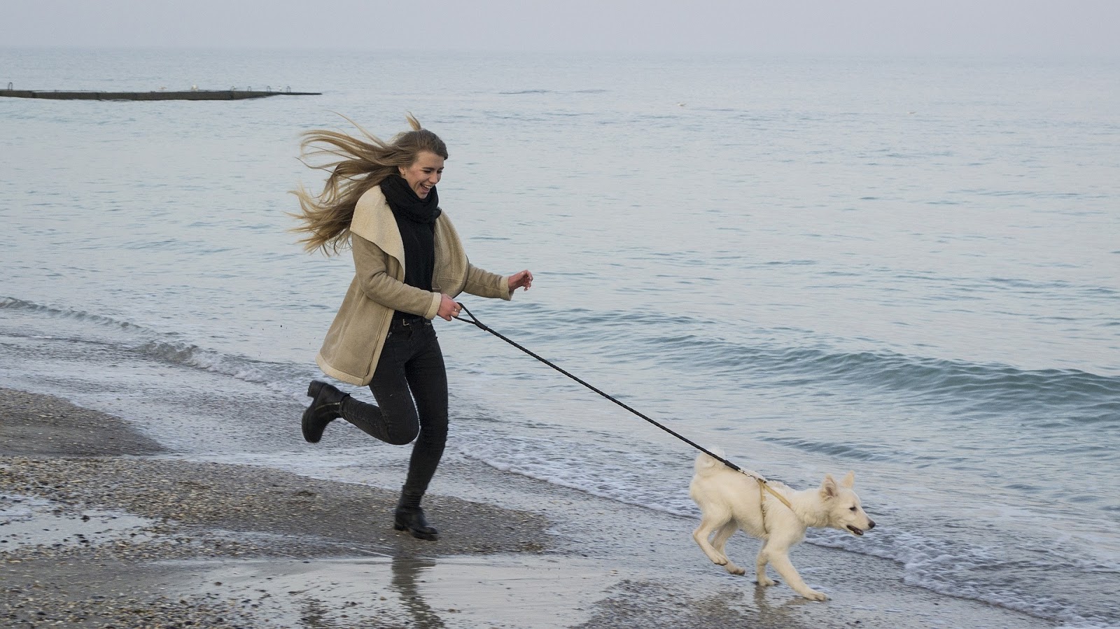 Woman Running With Dog