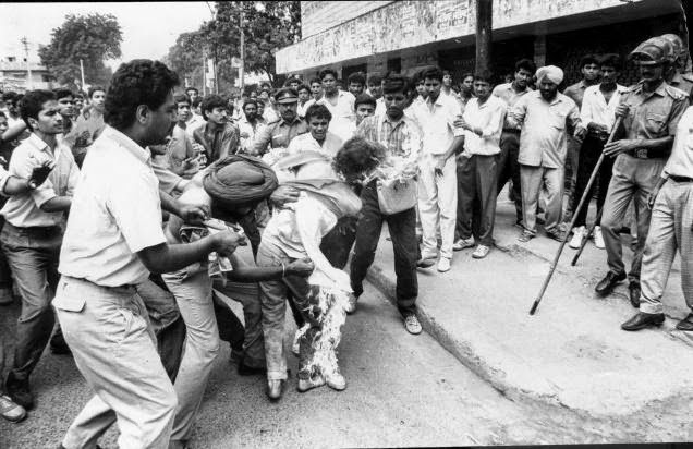 Student Rajiv Goswami attempting self immolation.  