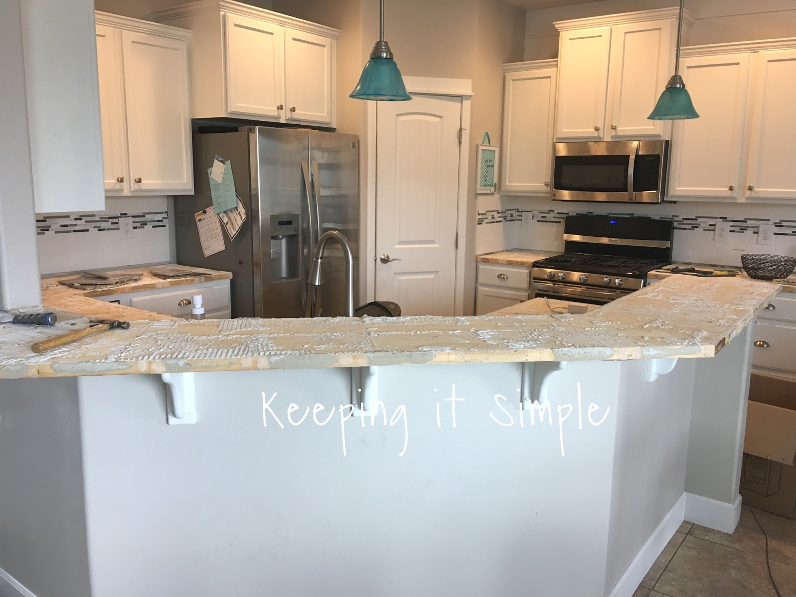 Tips On How to Replace Countertops In Your Kitchen {Iced White Quartz