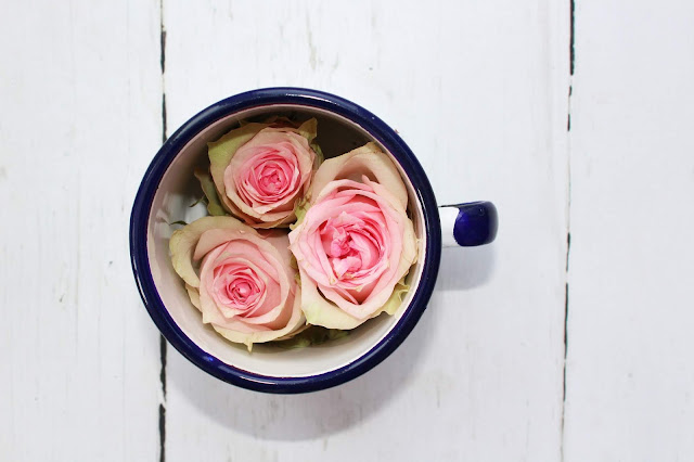 Roses in a tin cup