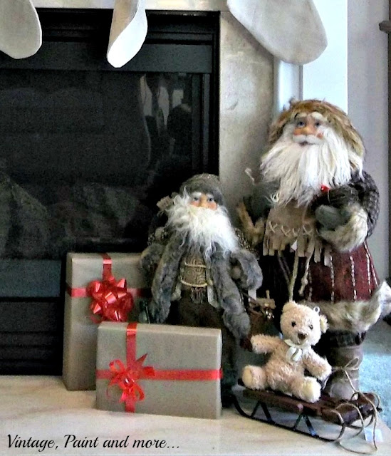 Vintage, Paint and more... Christmas mantel with vintage Santas and sleigh,  brown paper wrapped packages