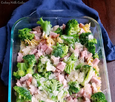 ham and broccoli layerd over pasta in dish
