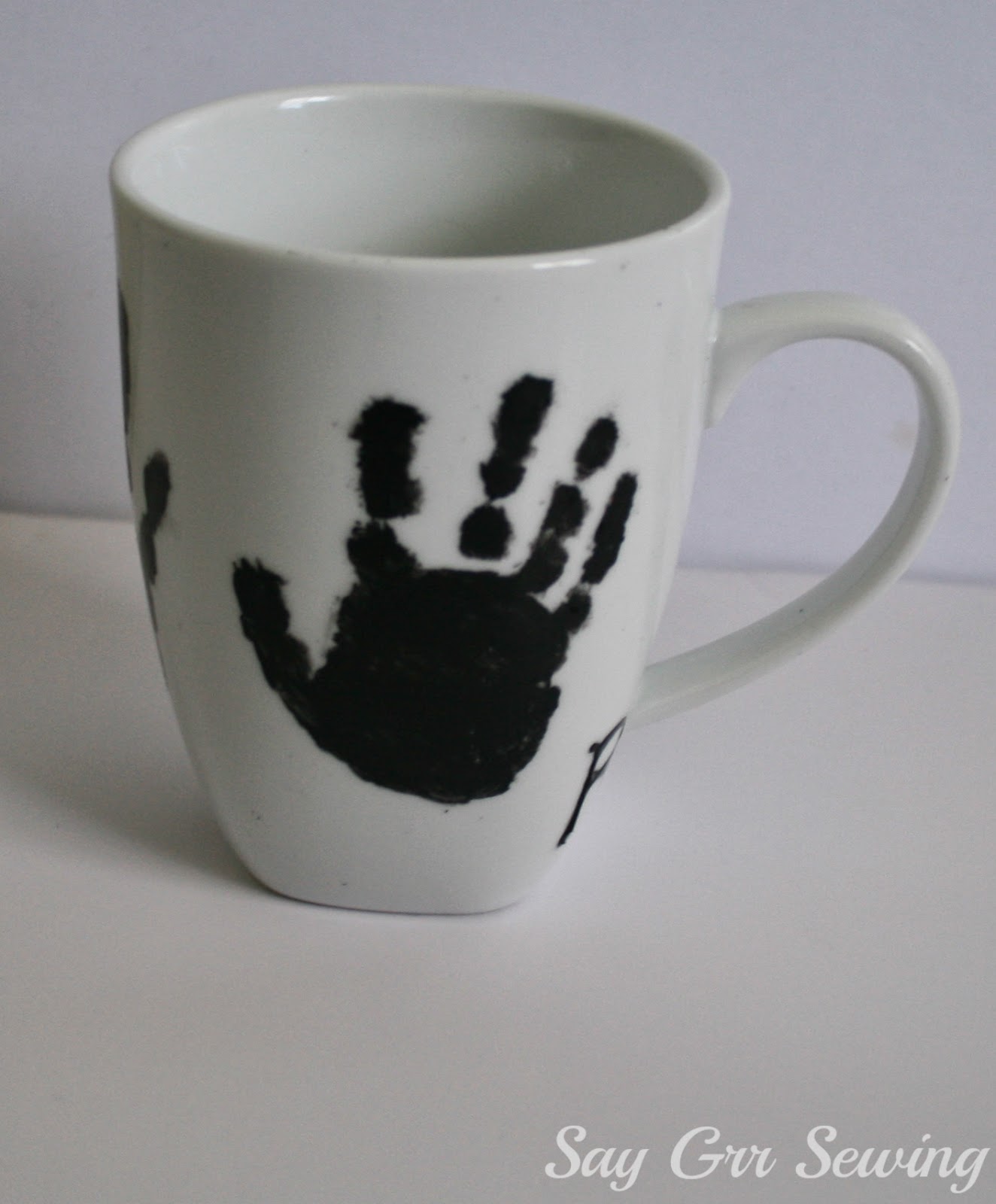 Say Grr Sewing Handprint Mugs