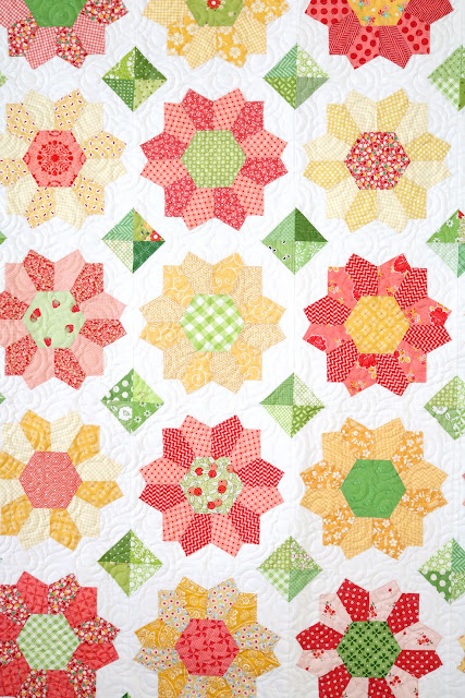 Dahlia quilt - an english paper pieced quilt by Andy of A Bright Corner.  A great scrap quilt using Playing with Paper starter set 43 by Sue Daley Designs