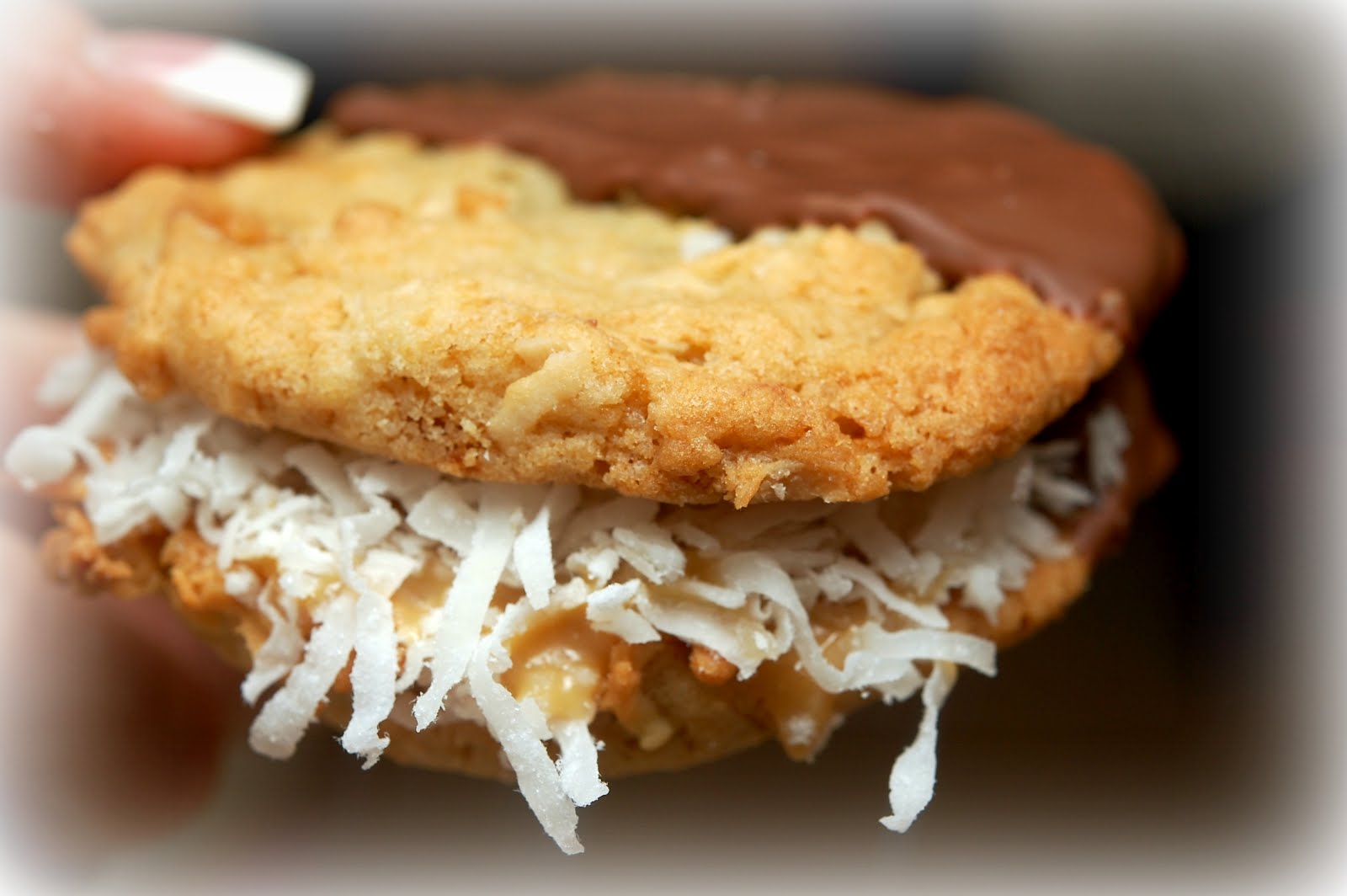 DULCE DE LECHE STUFFED COCONUT COOKIES DIPPED IN MILK CHOCOLATE Hugs and Cookies XOXO