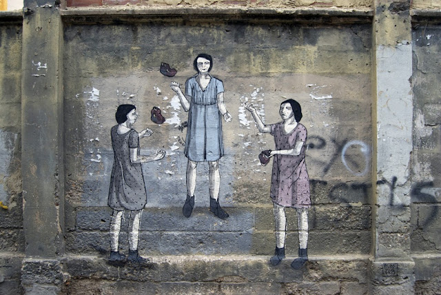 Women Juggling Hearts Mural By Street Artist Hyuro In Valencia, Spain.