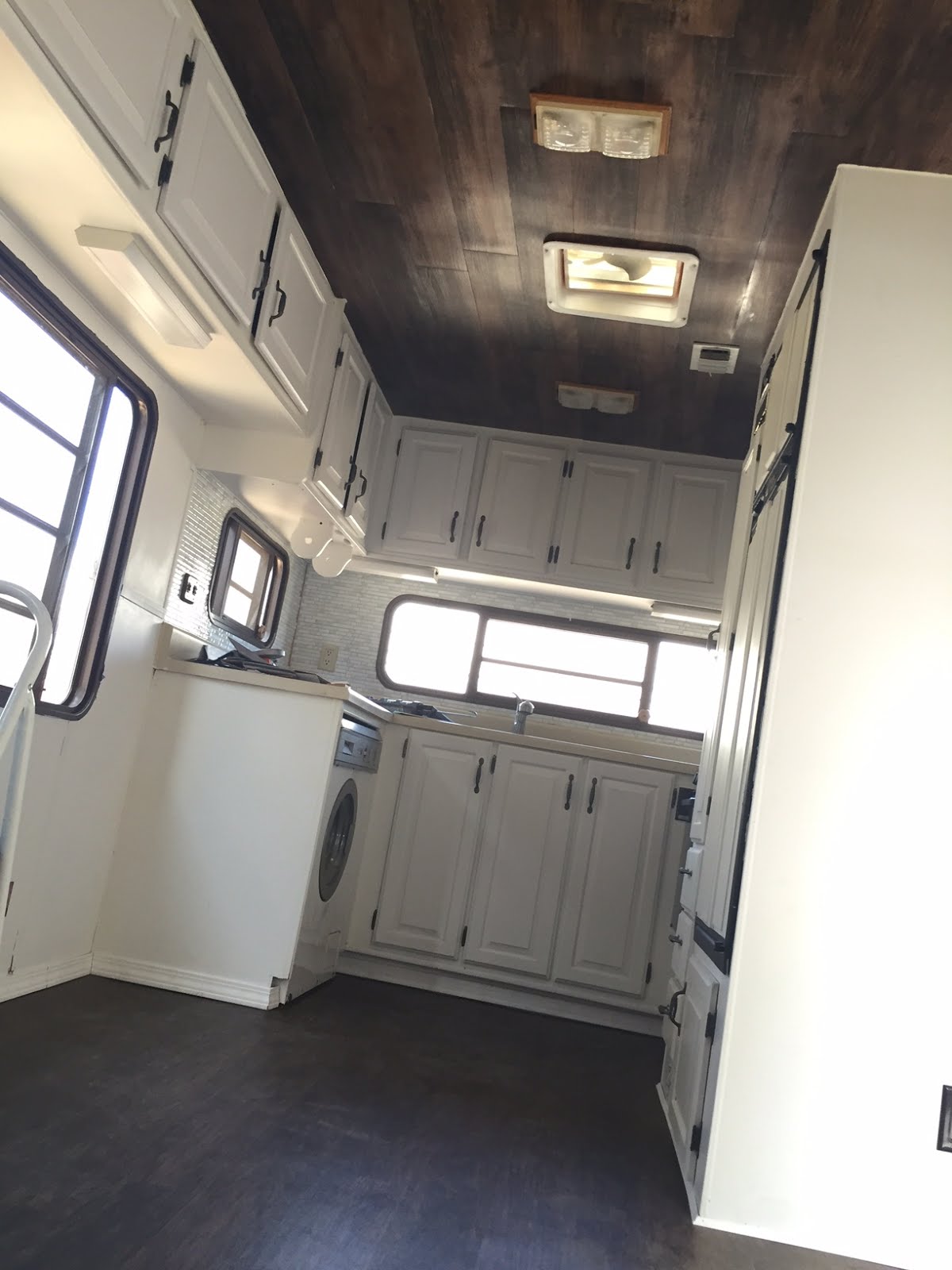 Ctrl Alt Dreamers RV Remodel Vinyl Plank Wood Ceiling