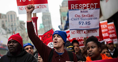 Minimum wage workers protesting