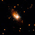 Hubble Temukan Lubang Hitam Supermasif yang Tertendang dari Pusat Galaksi