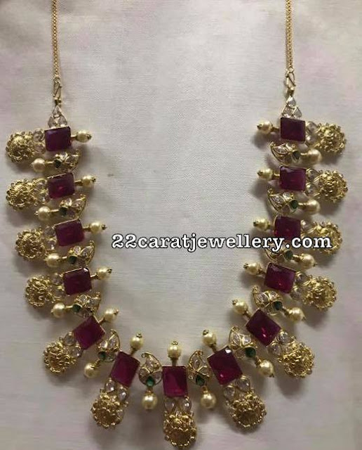 Antique Work Lakshmi Set with Rubies Antique Work Lakshmi Set with Rubies