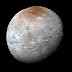 Pluto is painting red its companion Charon 