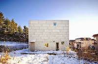 Hokkaido Vertical White House Design with More Loft and Platforms