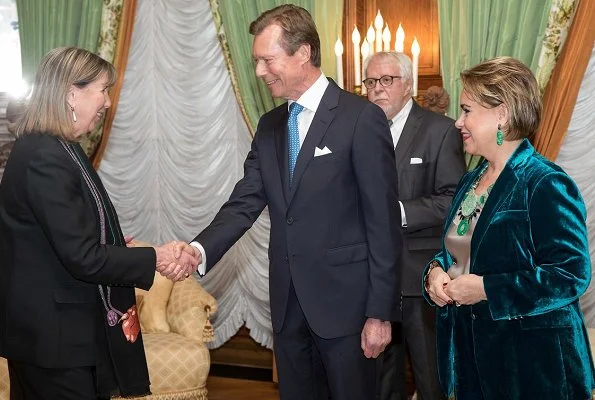 Grand Duke Henri and Grand Duchess Maria Teresa. Maria Teresa is wore greenvelvet suit. Princess Stephanie