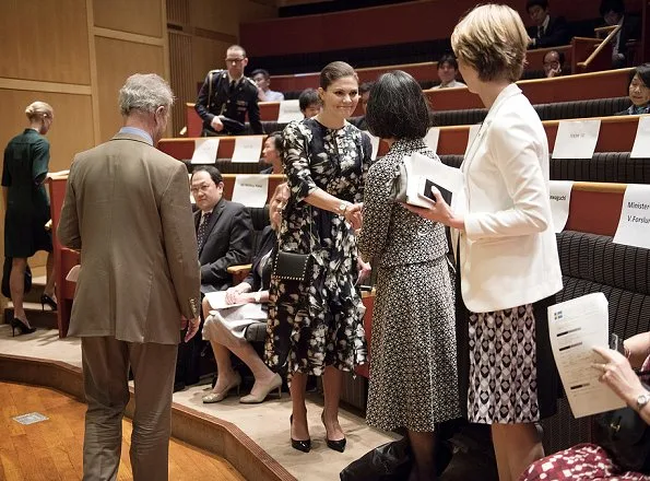 Crown Princess Victoria wore H&M Patterned Silk Dress from Conscious Exclusive Collection, Prada pumps and carried Valentino Garavani Clutch 