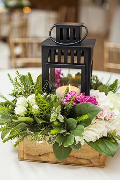 Stunning Lantern Centerpieces Sonal J Shah Event Consultants Llc While Traditional Centerpieces Tend To Be Tall And Ont These Rustic Lantern Provide A Unique Change Are Perfect For Outdoor Weddings