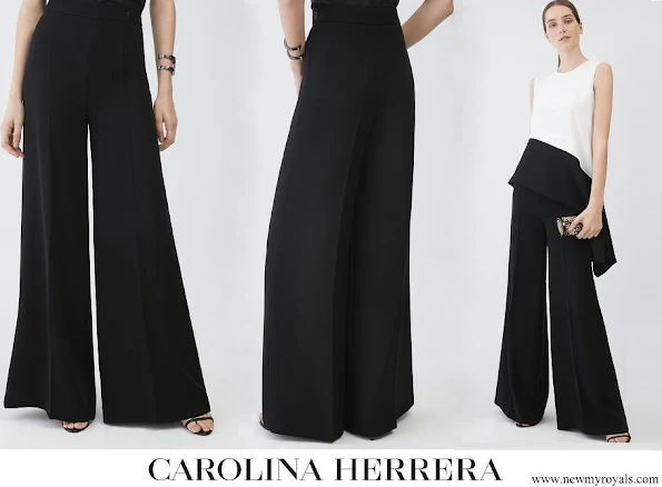 Queen Letizia wore Carolina Herrera black crepe wide leg trousers