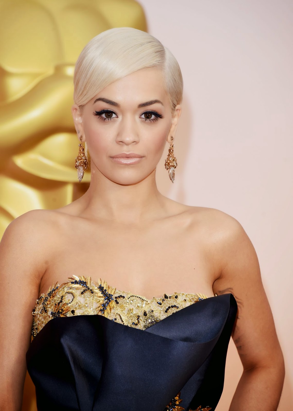 Rita Ora wears a Marchesa corset gown to the 2015 Oscars in Hollywood