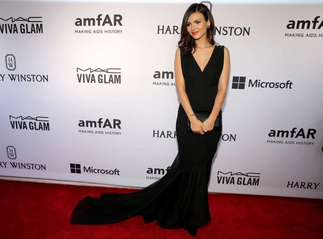 Victoria Justice in a sexy black dress at the 2015 amfAR Inspiration Gala