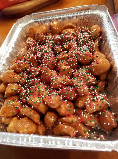 this is how to make struffoli it is just fried dough with drizzled honey and topped with sprinkles