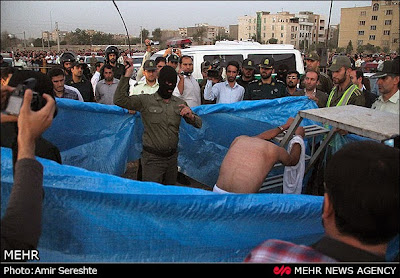 Flogging of a convict prior to his public execution in Karaj, Iran, in Aug. 2015 Flogging of a convict prior to his public execution in Karaj, Iran, in Aug. 2015