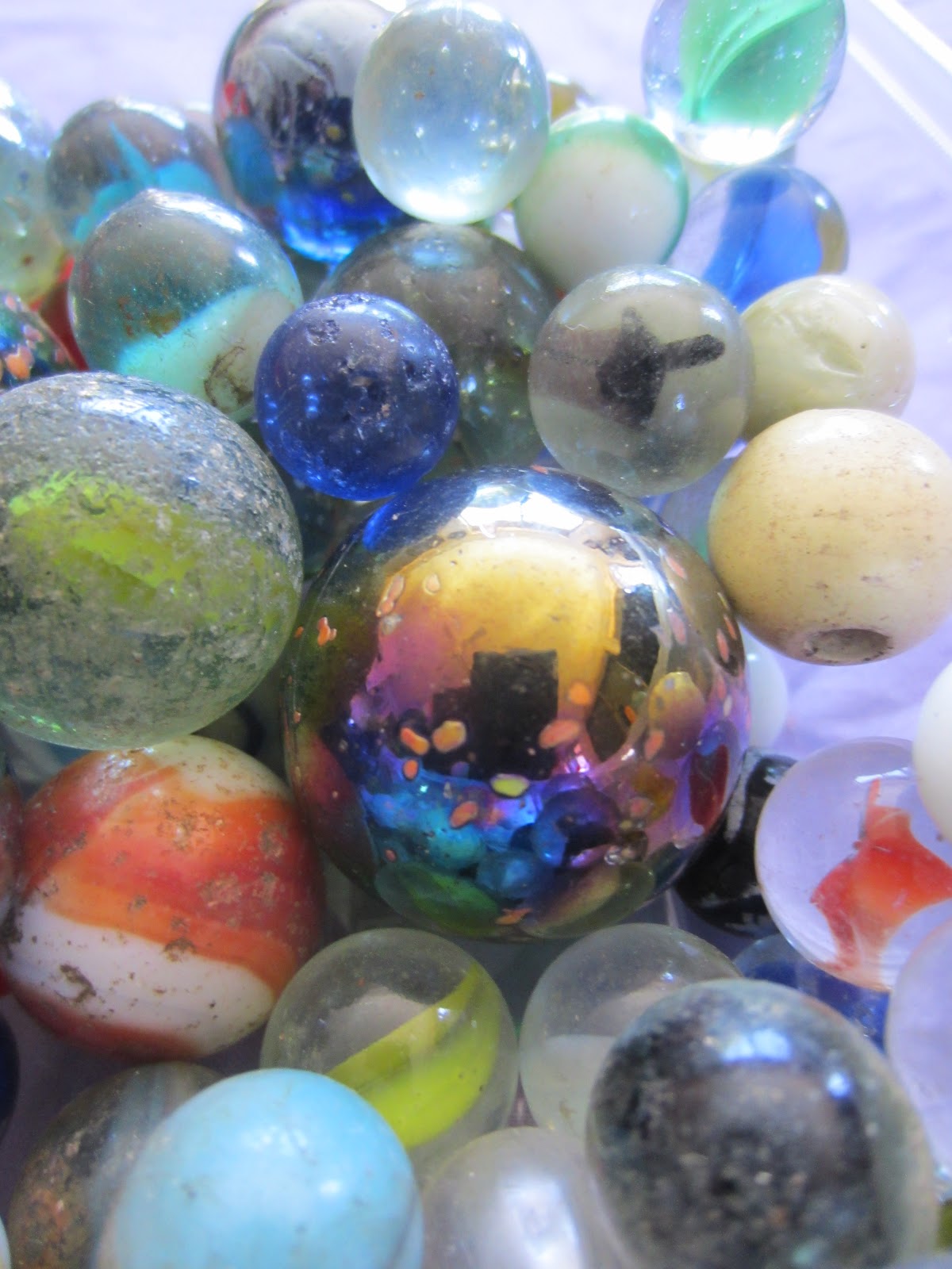Learn with Play at Home Explorations with marbles. An invitation to play