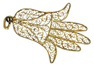 Tunisian Hand of Fatima Intricate metal amulet shaped int he form of a hand