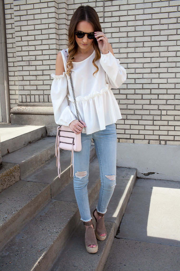 Ruffle cold shoulder top and distressed denim