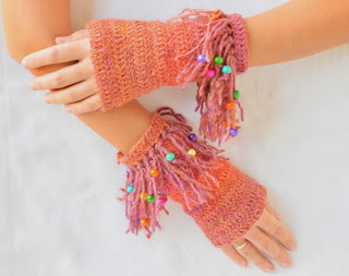 http://www.etsy.com/listing/165910827/crochet-fingerless-mittens-hippie?ref=shop_home_active