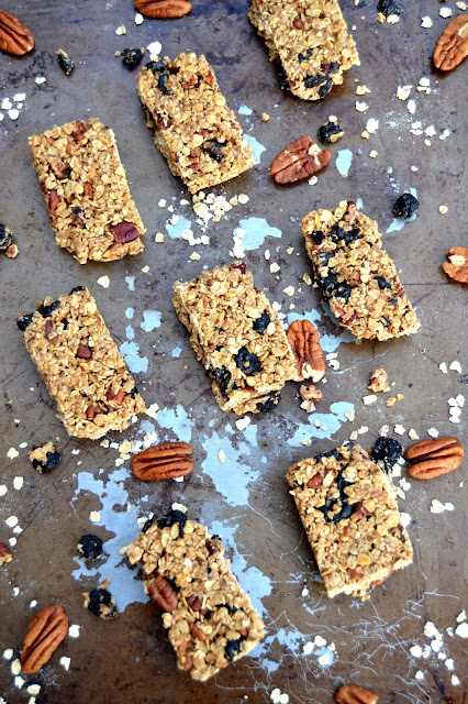 Granola bars with oats, maple syrup, coconut oil coconut sugar and dried blueberries.