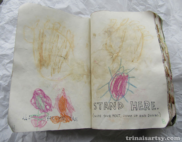 Wreck this Journal - stand here featuring little children's footprints