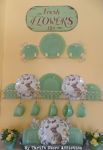 Add a touch of spring to your kitchen by pairing vintage jadeite with fresh flowers and an assortment of bunnies! jadeite springtime kitchen vignette