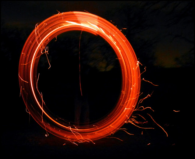 Open shutter photograph of playing with fire in LBJ National Grasslands in Texas