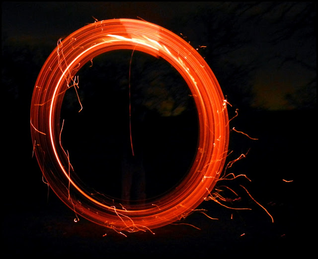 Open shutter photograph of playing with fire in LBJ National Grasslands in Texas Open shutter photograph of playing with fire in LBJ National Grasslands in Texas