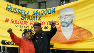 Maroon's daughter, Theresa Shoatz, with Chuck D at NYC event., From ImagesAttr