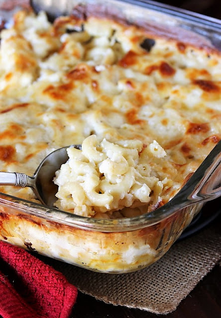 Baked Macaroni and Cheese with Serving Spoon Image