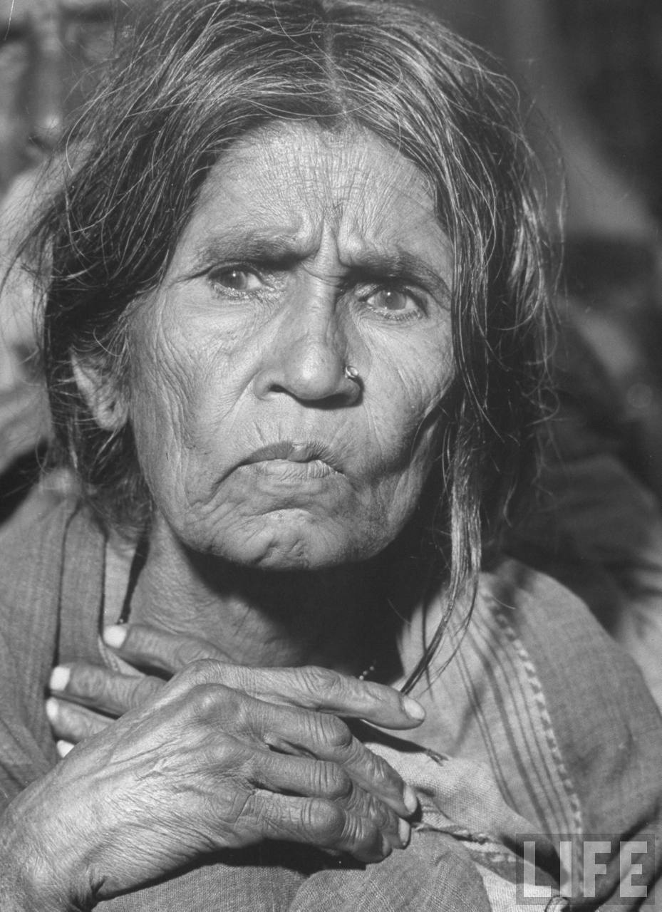 Starving Indian woman who has aged significantly as a result of famine over the last 2 years, due to a drought