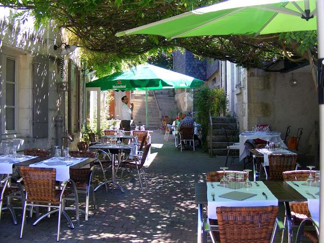 Restaurant terrace.  Indre et Loire, France. Photographed by Susan Walter. Tour the Loire Valley with a classic car and a private guide.